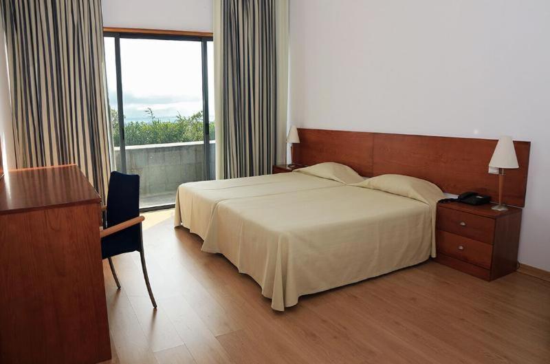 Hotel Colombo Vila do Porto Quarto foto